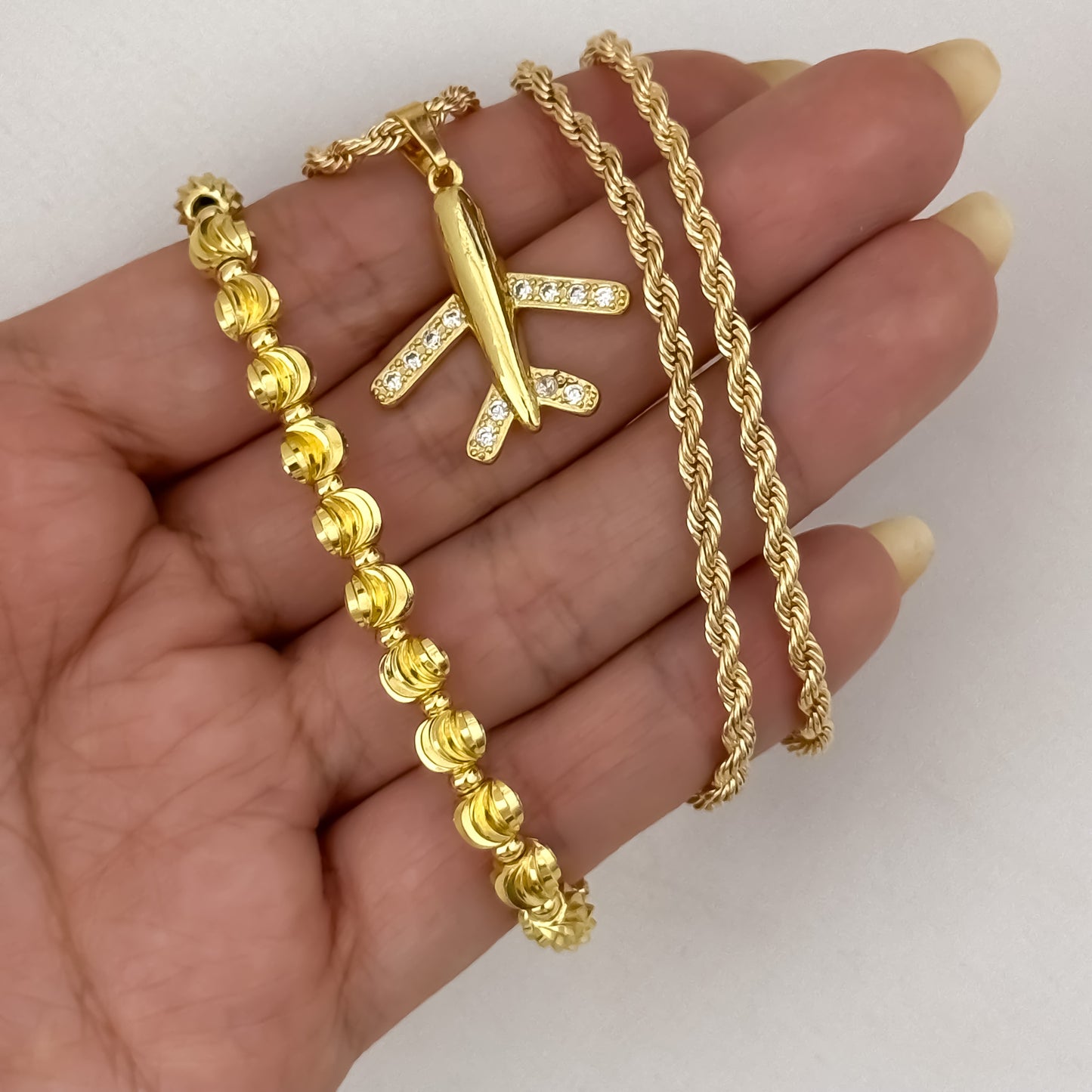 Cadena Tejido Lazo Siciliano de Dama de 45cm + Dije de Avion con Micro circones + Pulsera Tejida en Balin Italianode 6mm en Oro Laminado 18k con Garantia de por vida