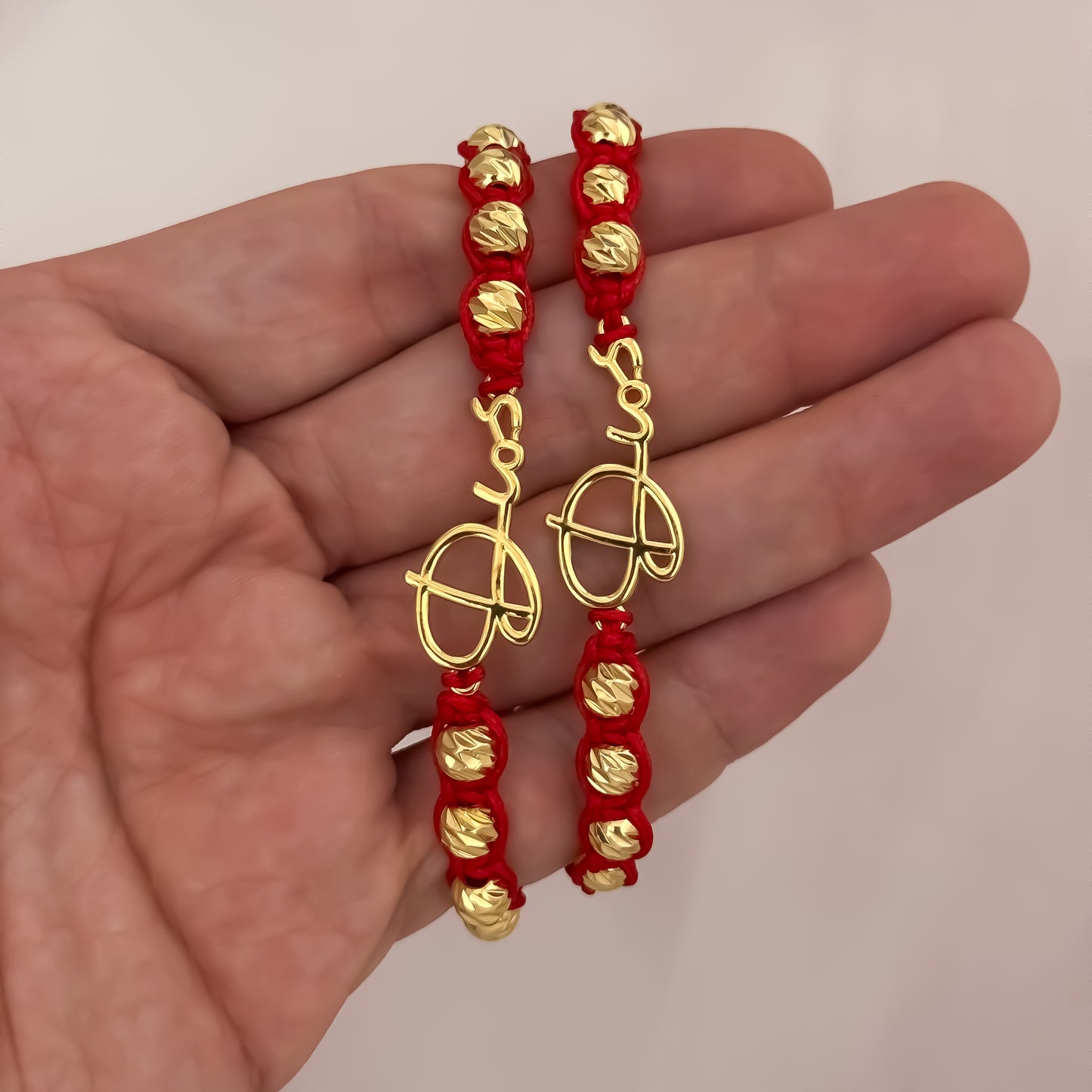 Pulseras Hilo Rojo con Herraje de Dios de Parejas en Balin Italiano de 6mm en Oro Laminado 18k con Garantia de por vida